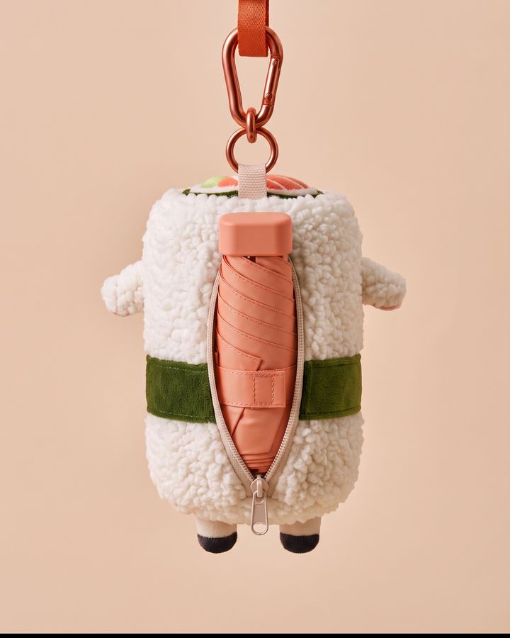 SuSheep con mini ombrello nella tasca